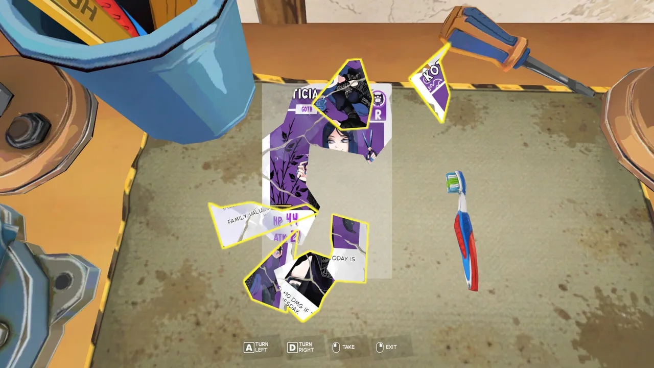 A damaged KOTAMON card split into outlined pieces on a workbench beside a repair tool